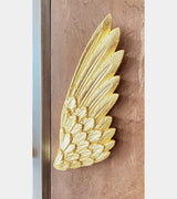 Niemeyer Bar Cabinet, detail of the gold wing handle