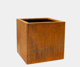 Handcrafted Corten Steel Planter Cube showcasing natural rust coloir, perfect for luxury garden design.