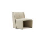 The Legacy Armchair by Domkapa: Innovative design meets comfort. This armless chair features customizable upholstery for a personalized touch.