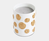 Luxury white porcelain candle by L'Objet, adorned with 24k gold coins for an elegant interior design accessory.