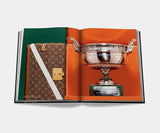 The Unveiling: Celebrating Victory with Louis Vuitton Trophy Trunks - Capture the electrifying moment a Louis Vuitton trophy case is revealed, commemorating sporting victory, showcased in this coffee table book.