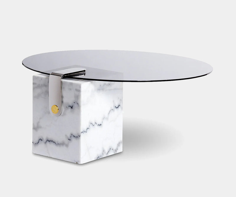 Luxurious white marble Patch coffee table with brass and stainless steel accents, featuring a polished glass top for modern high-end interiors.