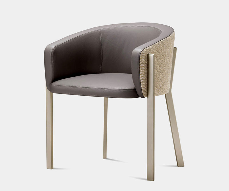 Elegant Ghidini 1961 Arch Chair with graceful contours, perfect for high-end home decor.