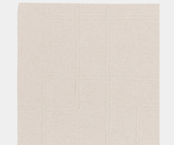 Versatile Ada Ivory rug available in multiple sizes, ideal for various luxury interior styles.