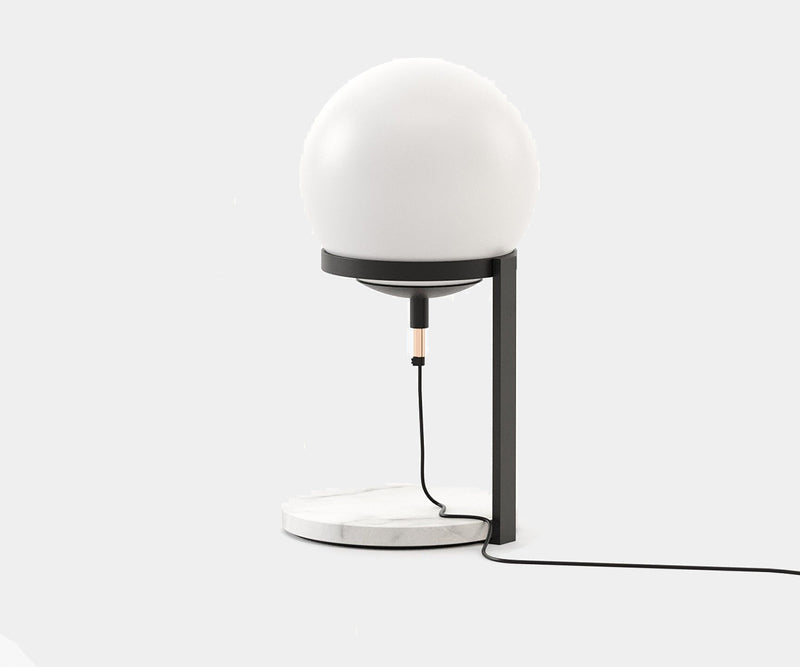 Laskasas Clarke Lamp, a statement piece with a spherical glass shade and marble base, enhancing elegant home decor.