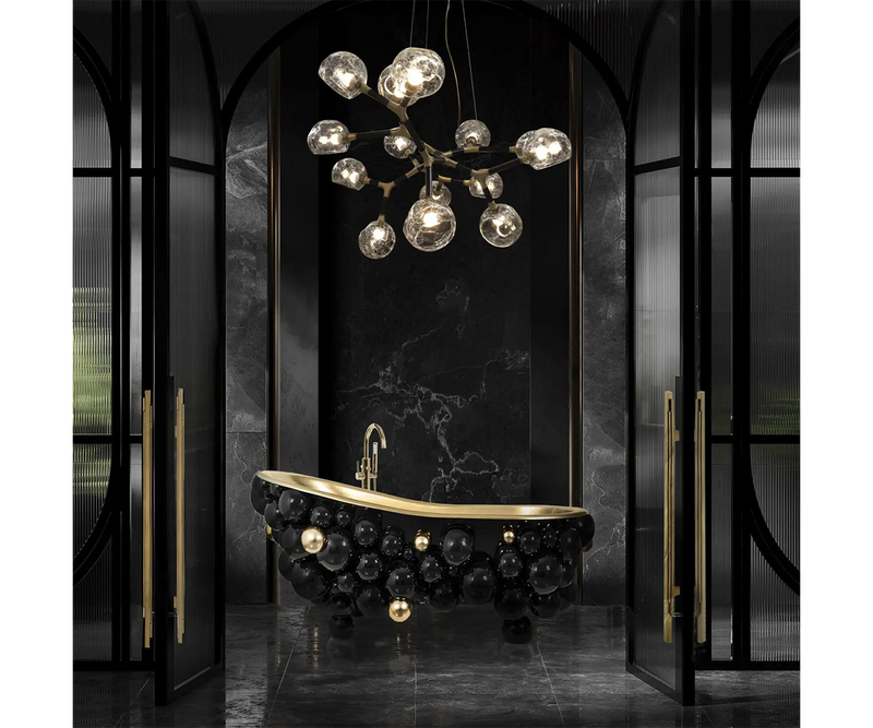 Luxury Newton Bathtub featuring gold-cast iron with high-gloss black lacquered spheres, designed by Maison Valentina.