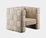 Luxury Sapporo armchair in light brown corduroy and suede upholstery, a statement piece for modern interior design.