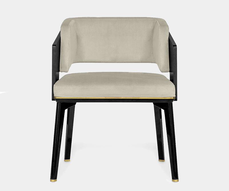 Modern dining chair featuring matte black oak frame and brown velvet seat from Luxxu