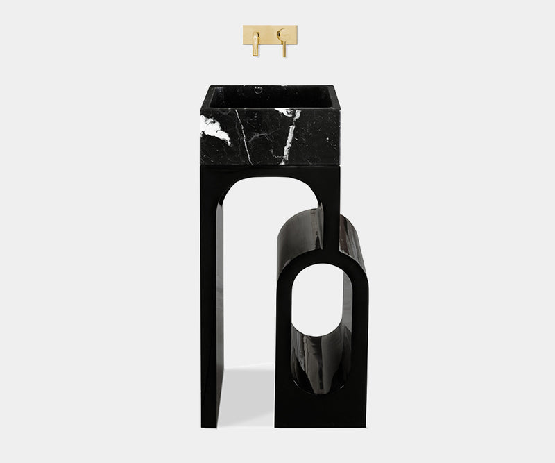 Elegant Colosseum Pedestal Sink in high-gloss black lacquer and Nero Marquina marble, perfect for a high-end bathroom.