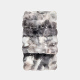 Cosy up with the Marble Rabbit Fur Throw Blanket. This luxuriously soft, faux rabbit fur throw adds a touch of comfort and style to any sofa or chair.