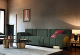 Massimo modular sofa in green velvet in a living room