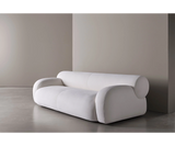 Contemporary Oscar sofa by Meridiani featuring plush cushions and elegant saddle leather detailing.