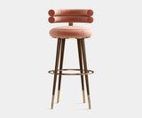 Elegant bar stool featuring polished brass accents and matte walnut wood base from the Mezzo Collection