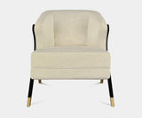 High-end home decor accent chair by KOKET with polished brass and velvet.