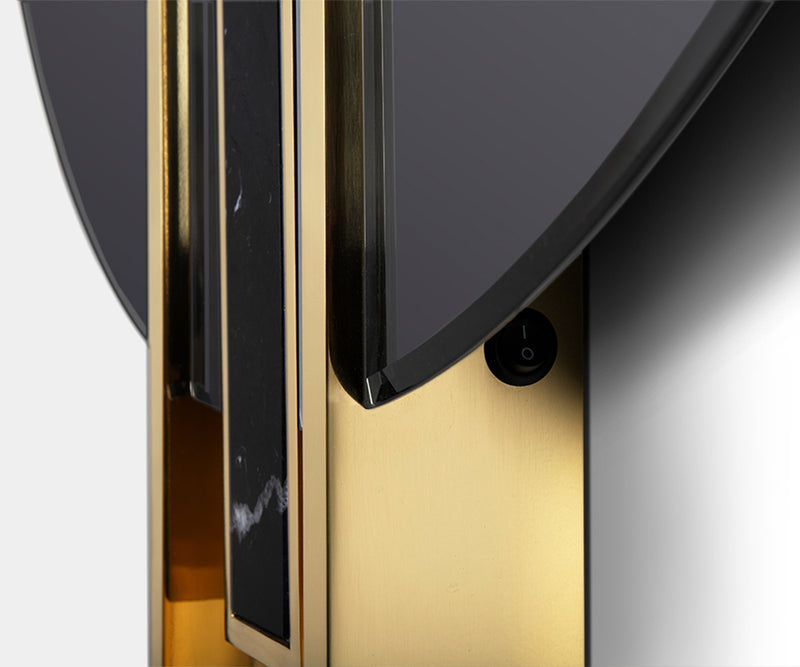 Timeless luxury mirror with a sleek design, combining polished brass and Nero Marquina marble.