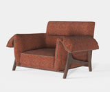 Luxury velvety armchair with walnut wood finish, ideal for modern interiors and sophisticated living spaces.