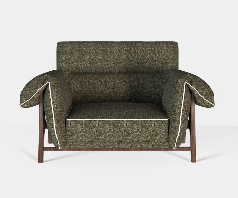 Muranti Austin Armchair showcasing an elegant design with contrasting piping and comfortable seating.