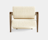 Vintage Luxury: Palmer Armchair with brass accents, a true conversation starter.