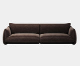 Luxurious Elastron Supersoft chocolate sofa in a modern living room, showcasing contemporary interior design.