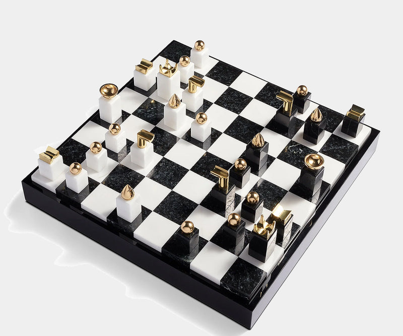 L'Objet luxury chess set displayed on a coffee table, combining functionality and artistic appeal.