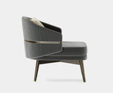 Elegant Billy Armchair by Private Label, featuring brushed brass accents and soft fabric upholstery.