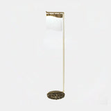 Castro Lighting Flow Floor Lamp in gold-plated brass with clear glass and a marble base, available from Touched Interiors UK