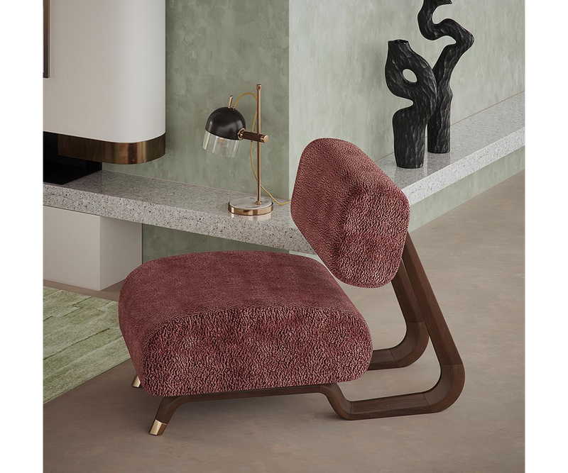 Spacious Living Room: Sloane Armchair, a luxurious centerpiece for your modern space.