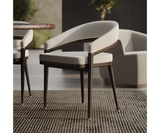 Ergonomic Erick Dining Chair with plush seating and elegant design.