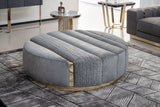 Giorgio Collection Charisma Round Ottoman in grey velvet with a light gold chrome base, room setting 1