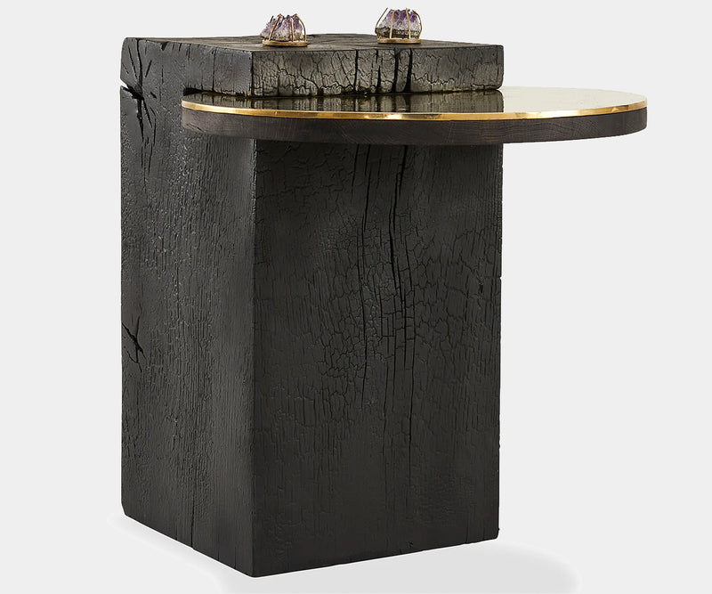 Unique luxury side table with blackened oak base and brass top, a fusion of natural beauty and opulent design.