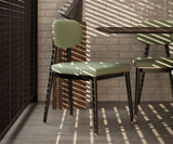 Oscar dining chair with minimalist design, featuring eucalyptus wood and refined brass accents for a modern luxury look.