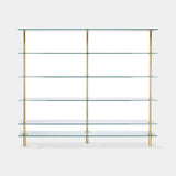 Sottile Brass Column Luxury Bookcase shown in polished brass with glass shelves