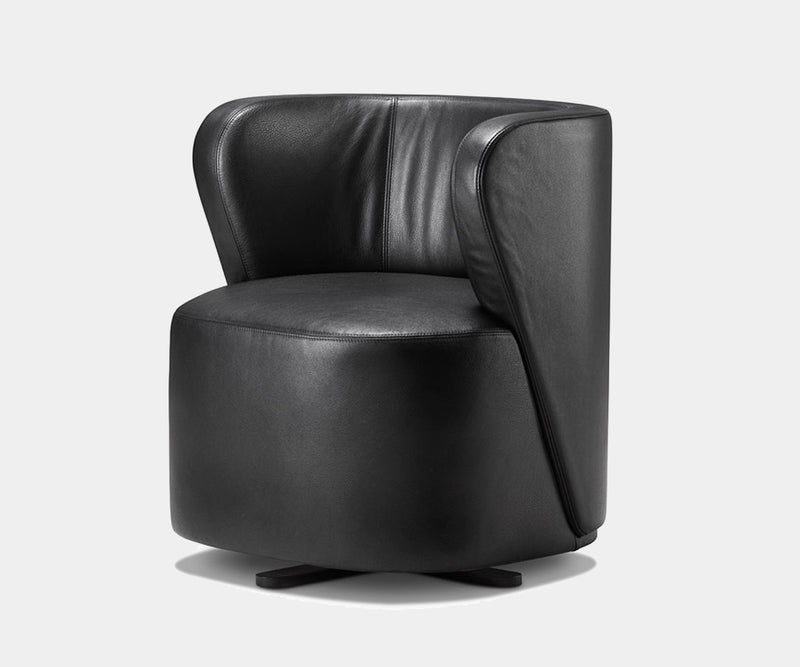 Ghidini 1961 Spritz Lounge Chair in black leather with swivel base for modern luxury interiors.