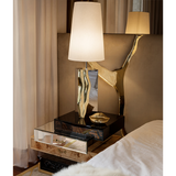 Discover the beauty of handcrafted design with the Lapiaz table lamp, a perfect statement piece