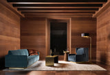 Touched D luxury velvet sofa with satin brass base styled in a wood panelled living room