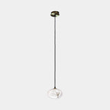 United Alabaster Oval Pendant Light in natural alabaster, single shade, studio view on grey