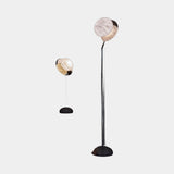 United Alabaster Reflex Floor and Table Lamp in natural alabaster, studio view on grey