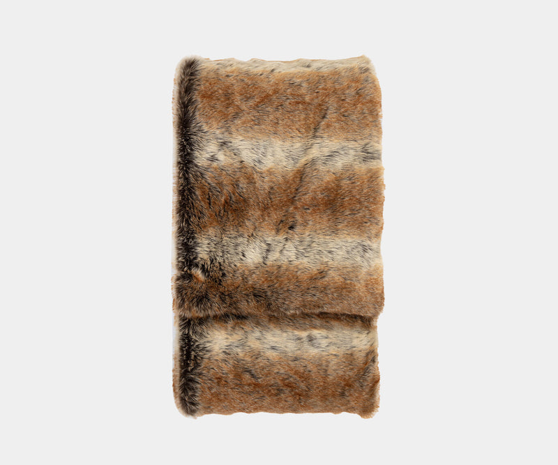 Sink into pure comfort with the Premium Faux Fur Throw. This luxurious throw boasts a deep pile, reminiscent of a Siberian Husky's fur, and is perfect for adding warmth and texture to your modern living room.