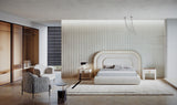Vetrina Luxury Rounded Bed with Stitched Leather styled in a luxury interior