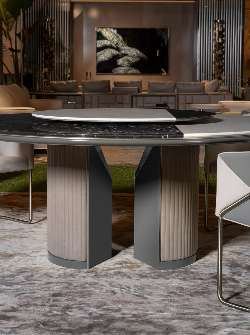 Quilted Leather Dining Table Base: The Visionnaire Palace Dining Table features a unique multifaceted base crafted from lacquered wood and upholstered in luxurious quilted leather. This detail adds a touch of texture and visual interest to the design.