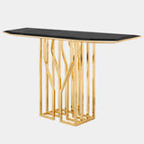 Luxury Home Decor: The Scarp Console: Elevate your entryway or living space with the Scarp Console, a luxurious statement piece featuring a Nero Marquina marble top and polished brass legs.