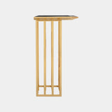 Modern Foyer Focal Point: The Scarp Console: This modern foyer console table, the Scarp Console, features a rebellious design with polished brass legs and a sleek Nero Marquina marble top, perfect for hospitality projects.