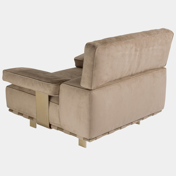 Luxury Italian Seating Comfort: The Montparnasse Armchair by Visionnaire offers exceptional relaxation with its plush cushions, adjustable headrest, and unique upholstered strap design.