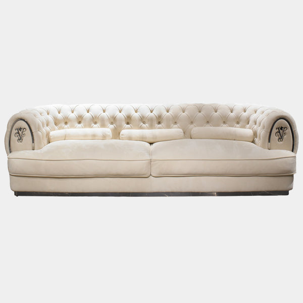 Visionnaire Oberon: Luxurious modern sofa in opulent design, featuring sculpted curves, plush comfort, and customisable metal accents.