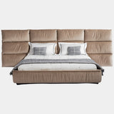 Visionnaire Palau Regular Bed: Modern luxury bed featuring a unique feather headboard for ultimate comfort. Upholstered frame with a matelassé effect and customisable metal finishes create a sophisticated and inviting bedroom haven.