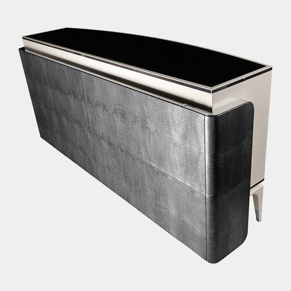 Luxury Italian Storage: The Palawan Cabinet by Visionnaire offers a stunning focal point with its curved engraved mirror doors and sleek black glass top.