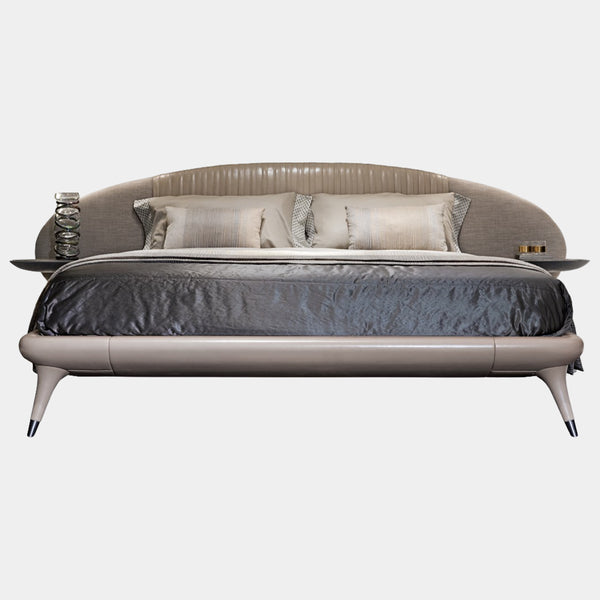 Visionnaire Princess Bed Frame: Modern luxury bed frame featuring a curved headboard, customisable leather or fabric upholstery, and metal-capped legs.